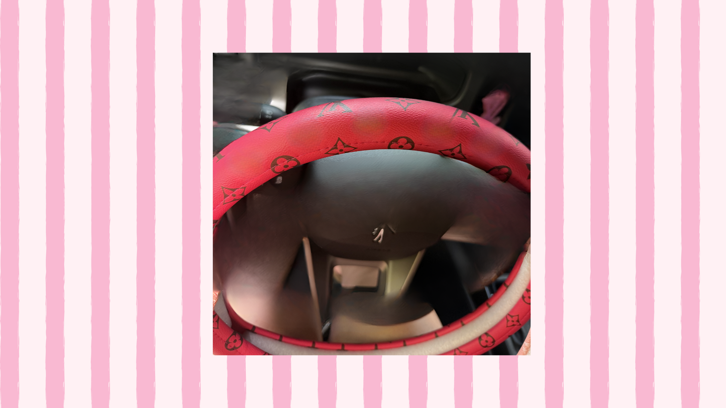 pink and brown steering wheel cover